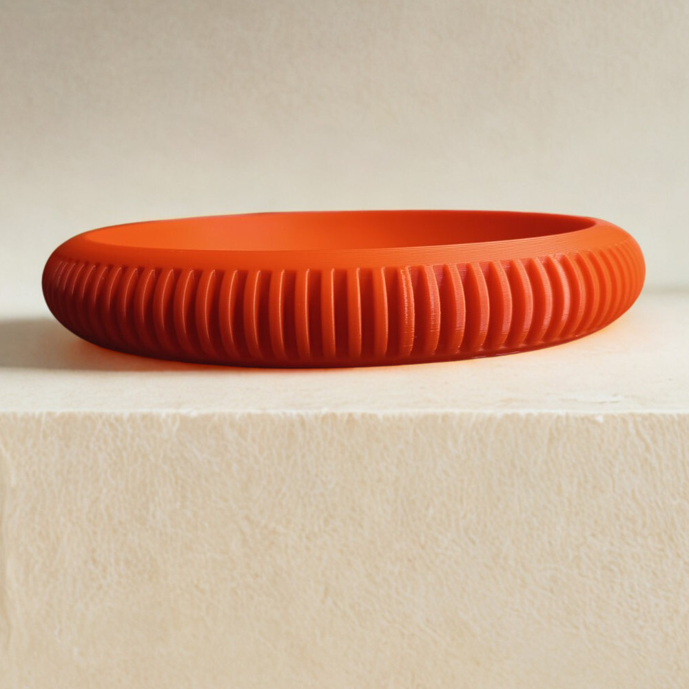 Πλαϊνή όψη κόκκινου 3D printed δίσκου Ripple Tray που αναδεικνύει την ανάγλυφη υφή.